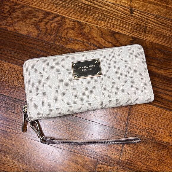 Michael Kors Handbags - Michael Kors Tan and Beige Wristlet Long Wallet